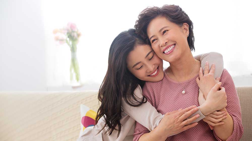 Mother and Daughter hugging
