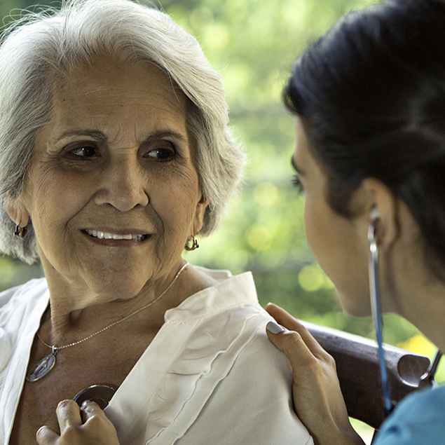 Older woman being checked by Doctor