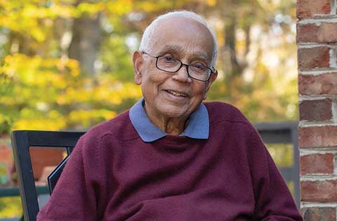 Happy gentleman smiling at the camera