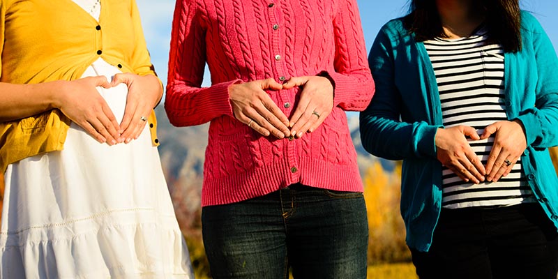 Three pregnant women