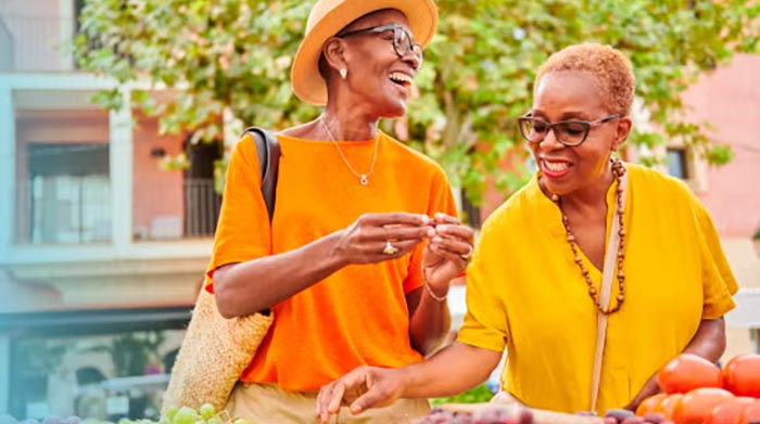Women at fruit stand